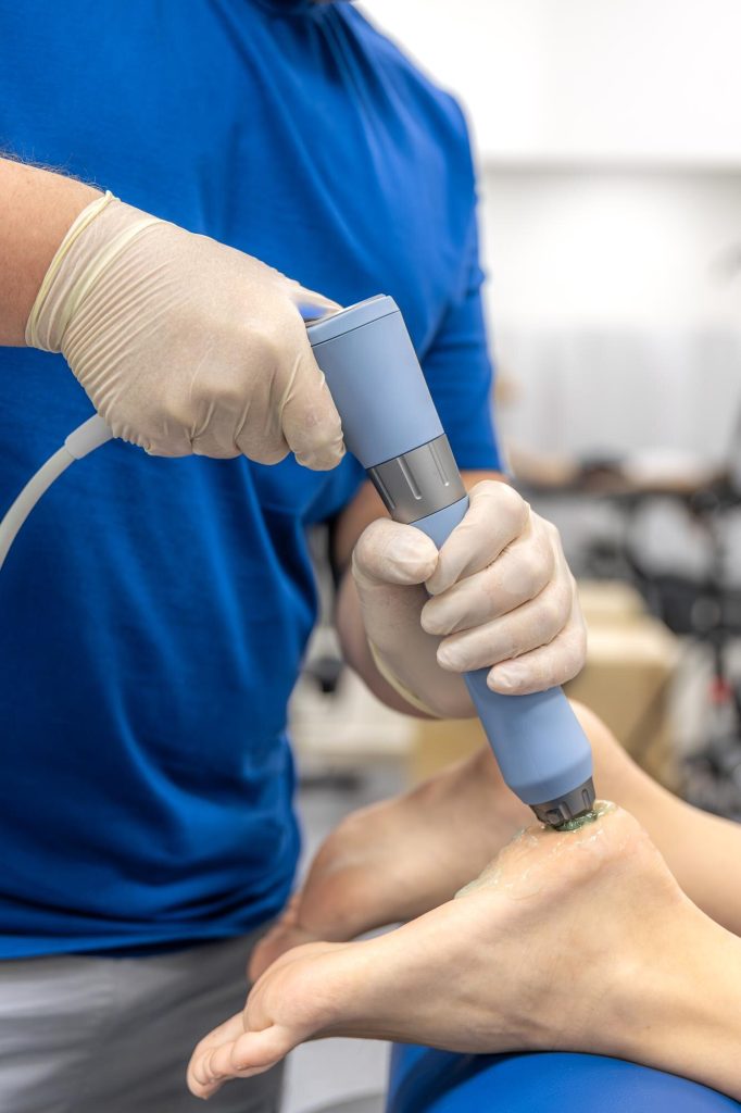physiotherapist performs ultrasound therapy on female patient knee joint rehabilitation 169016 71665